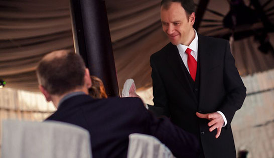 Auckland magician Vas Kovalski performs at wedding party