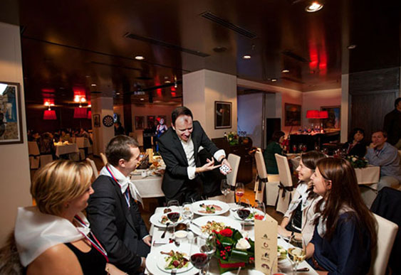 Auckland magician Vas Kovalski performs at wedding party