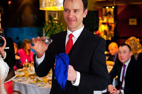 Auckland magician Vas Kovalski performs at wedding party