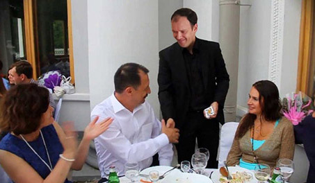 Auckland magician Vas Kovalski performs at wedding party