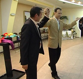 Auckland magician Vas Kovalski performs at wedding party